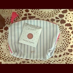 Ipsy bag with makeup.